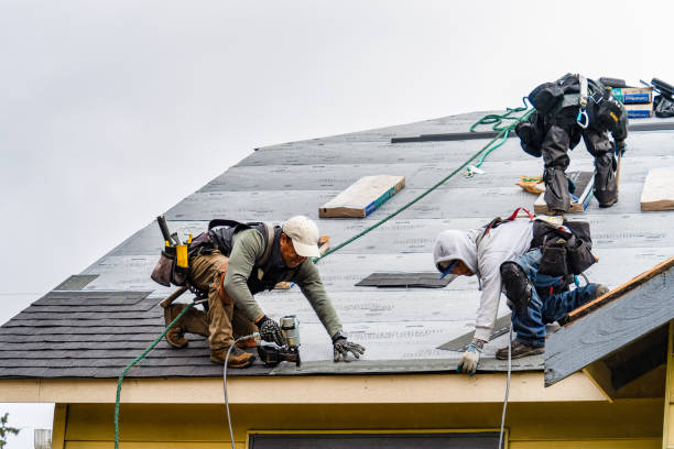 Professional Roof Replacement technician working in Danciger, TX
